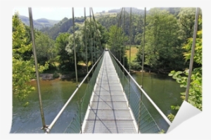 Narrow Suspension Bridge Over A River With Lots Of - Bridge