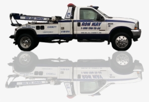 A White Ron May Towing Tow Truck With A Reflection - Tow Truck