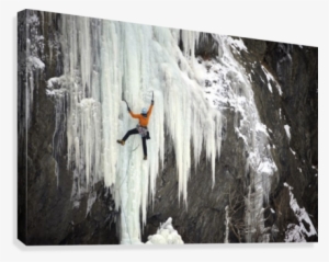 Ice Climber Ascends A Large Icefall In Southcentral