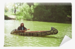 North American Indian Floats Down The River On A Canoe - Canoe