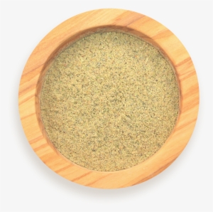 A Scoop Of Cardamom In A Wood Spice Jar
