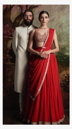 AI generated Indian groom dressed in white Sherwani and red hat with  stunning bride in red lehenga stand and hold each hands walking outside  34797765 Stock Photo at Vecteezy