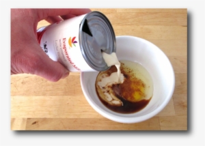 Pouring Evaporated Milk From A Freshly Opened Can - Can Of Evaporated Milk Opened