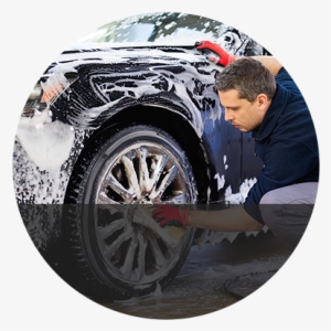 Man Cleaning The Wheel