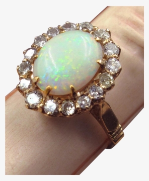 glowing opal ring in 14k rose gold with diamond halo - gold