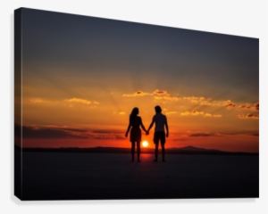 Couple Holding By Hands At Sunset Canvas Print - Sunset