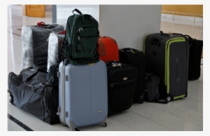 An Essential Guide To Travelling As An Oap - Suitcases At The Airport