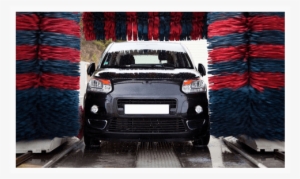 Auto Car Wash Tunnel Under Soaping And Rinsing - Penguins Car Wash & Detail Center