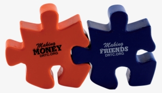 An Orange And A Blue Puzzle Piece Linked Together - .org
