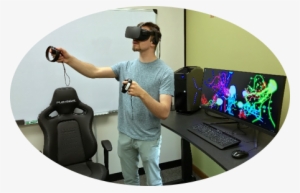 Student Wearing Oculus Rift Headset - Maureen And Mike Mansfield Library