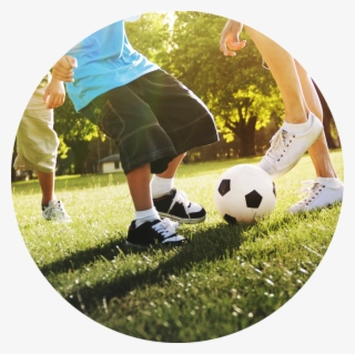 Little Boy Playing Soccer With His Father Concept - Family Playing Sports