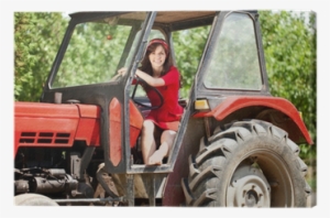 Women Driving A Tractor