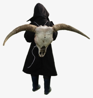 personthis kid is wearing a skull on his back - horn