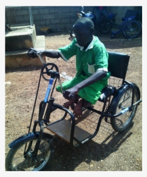 Emmanuel On His Tricycle In South Sudan In - School
