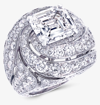 A Graff Swirl Ring Featuring An Emerald Cut Diamond